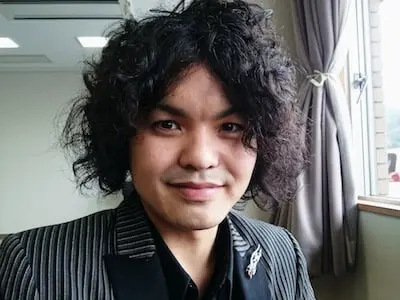 儀間太久実